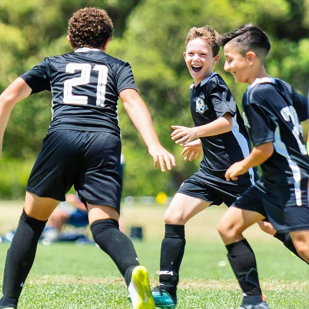Game Day Soccer Academy team huddle