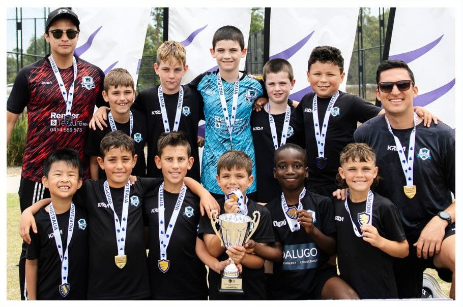 Game Day Soccer Academy players in training huddle